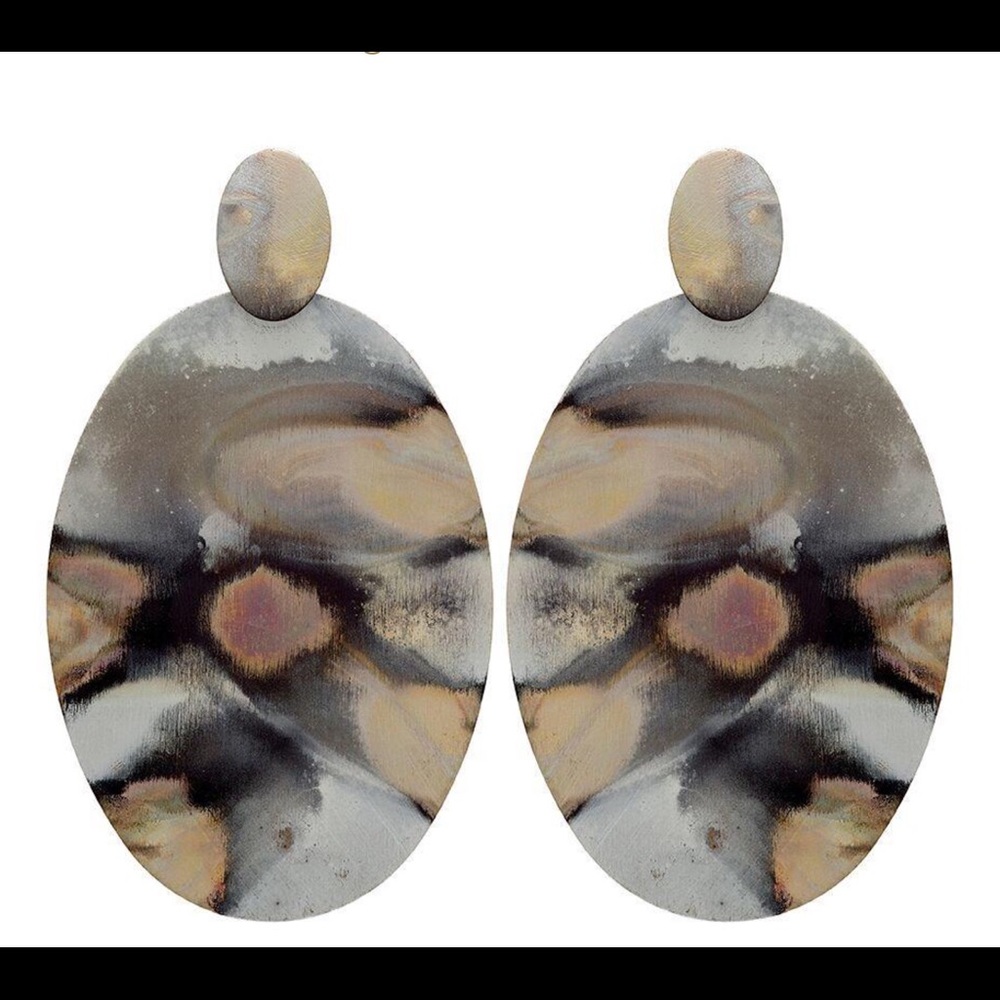 Sheila Fajl burnished silver earring .